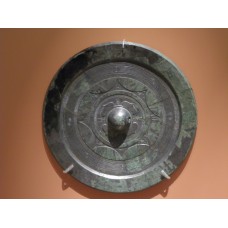 Bronze mirrors, eight-point solar disc, sun symbol